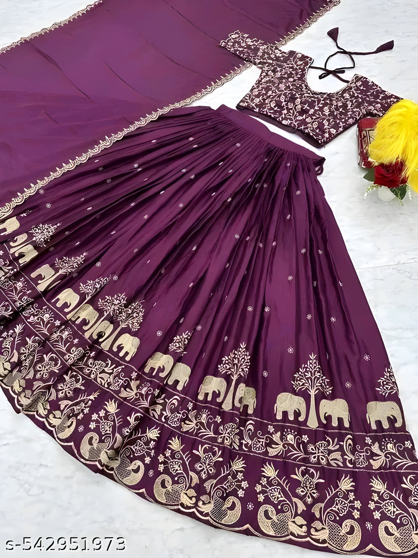 Purple and gold-toned embroidered lehenga choli with dupatta
